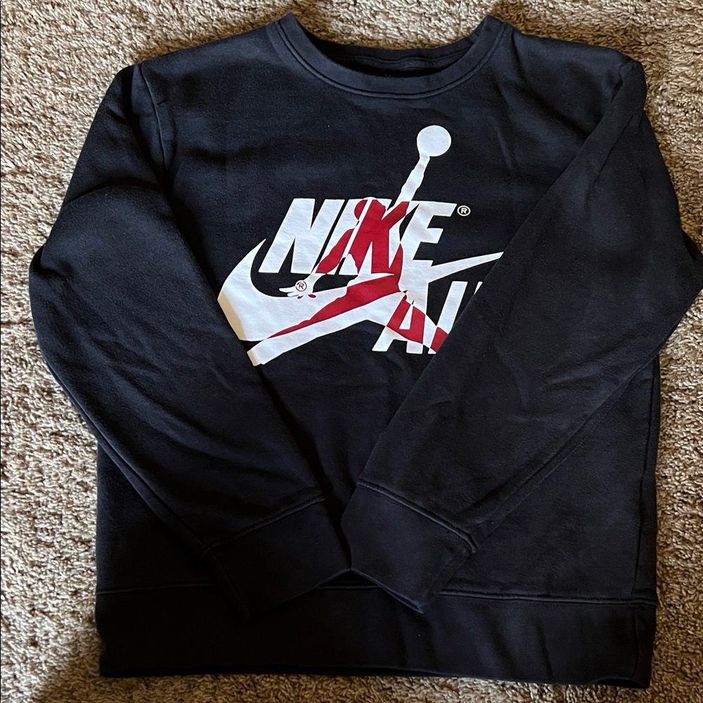Nike Kids Black Crewneck Sweater With A White and Red Logo. Like New Condition.
